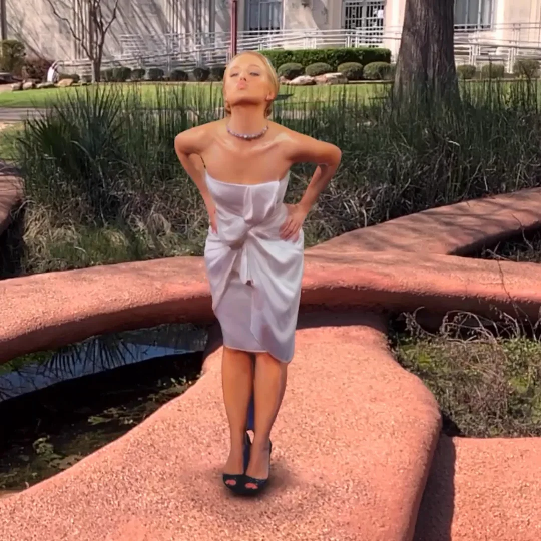 Kristen Bell AR capture placed beside an outdoor fountain